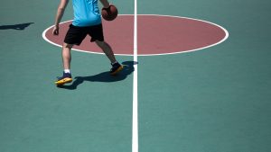 man-dribbling-basketball